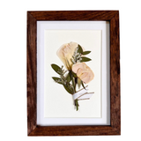 Preserve your bouquet by creating a pressed flower display