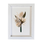 Preserve your bouquet by creating a pressed flower display